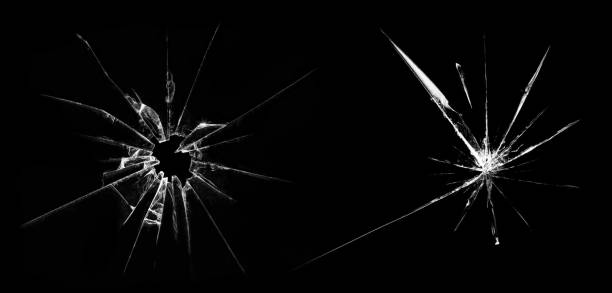 黒の背景にガラスの破片 - bullet hole glass cracked hole ストックフォトと画像