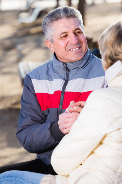 istock Cheerful couple heats palms with each other 681883268