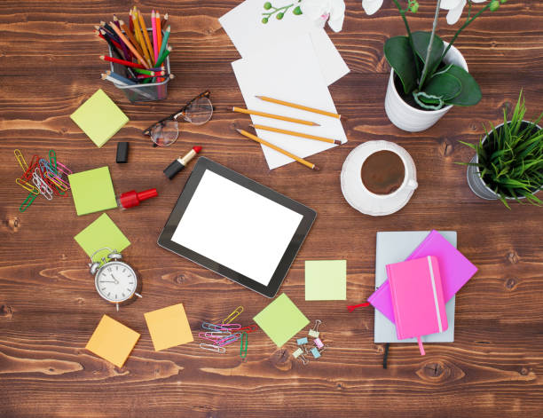 istock Creative office supplies and tablet on wooden background 681886798