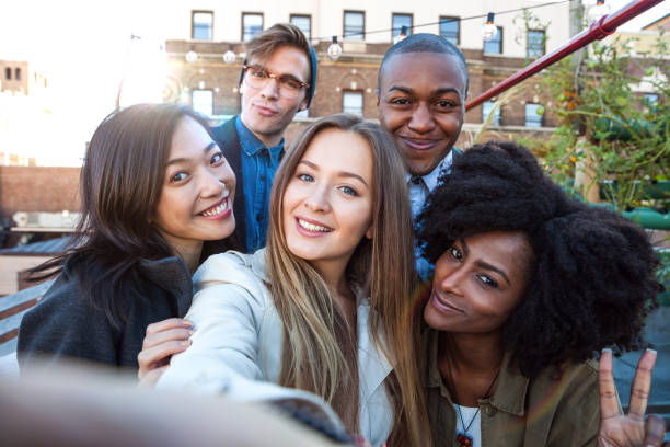 istock Friends have fun in a New York rooftop party 681895774