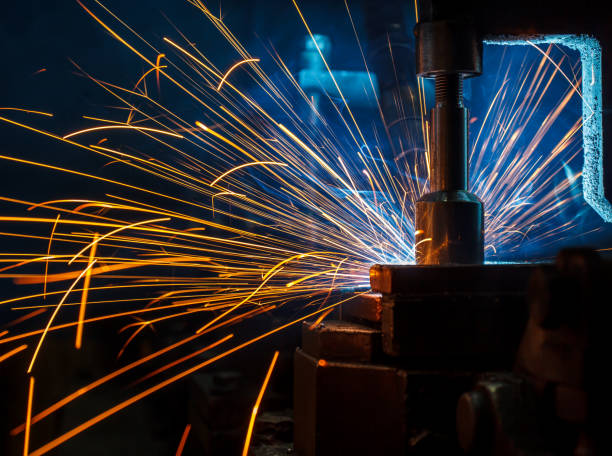 istock Welding robots movement in a car factory 681896274