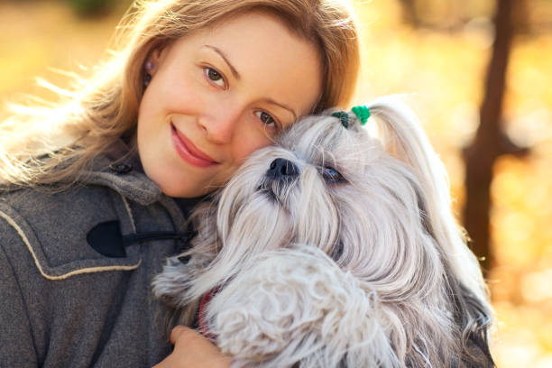 istock Woman with dog 681896338