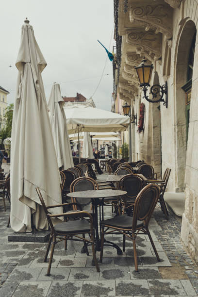 istock Empty street cafe. Rainy day 681896354