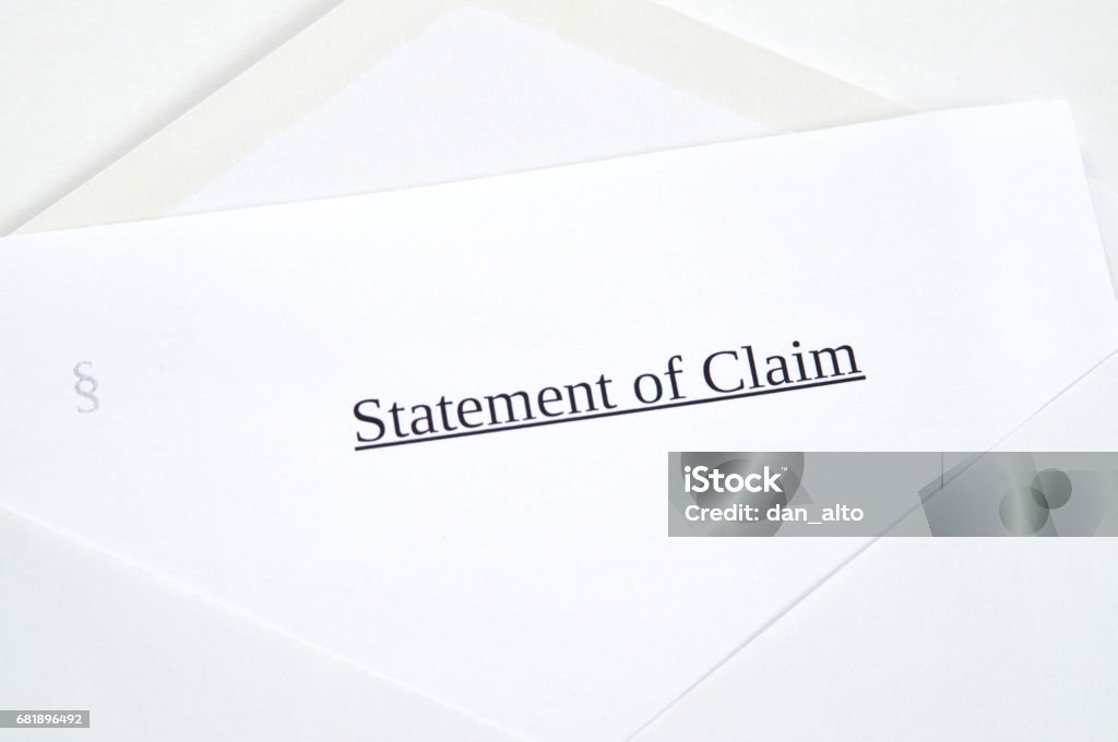 Statement of Claim printed on white paper and envelope, white background Abstract Stock Photo