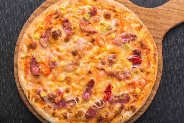 istock italian pizza with sausage and pepperoni 681899208