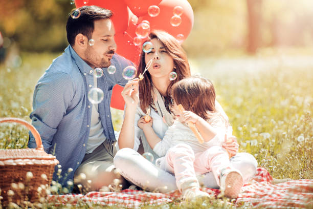 istock Happy young family having fun 681906600