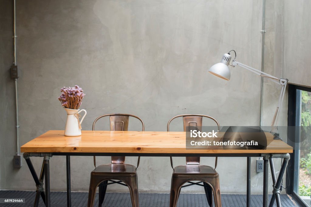 Modern desks with cement wall Apartment Stock Photo