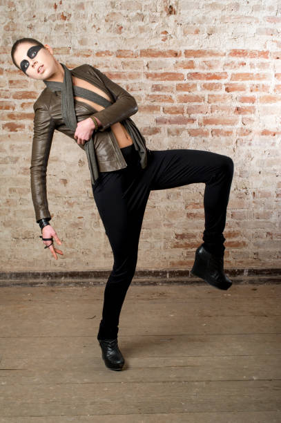 istock young woman in baggy trousers with leather jacket 681925132