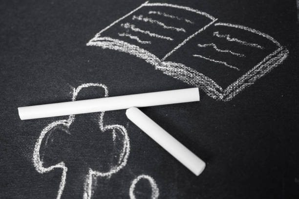 istock chalk board with chalk bible and cross 681932836