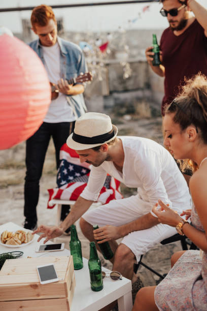 istock Friends are having a party on the rooftop 681939070