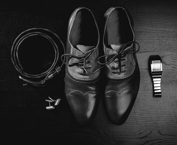 istock Male accessory. Shoes with belt and watch 681939656
