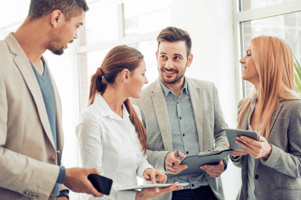 istock Positive business team working at office 681940002