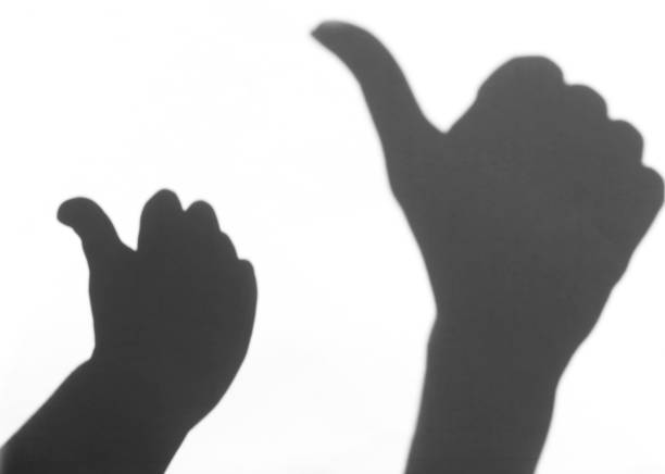 istock the shadow of the hand white background close-up 681941228