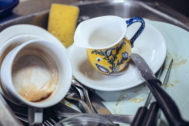 istock Dishes in the sink 681942506