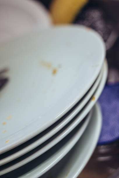 istock Dishes in the sink 681942580