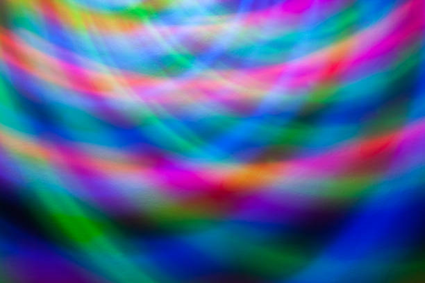 istock Abstract background of colored lights in a motion 681943330