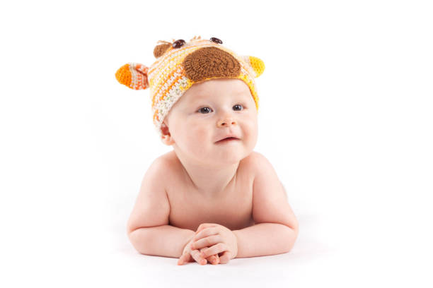 istock cutie little boy in white diaper and deer hat 681946206