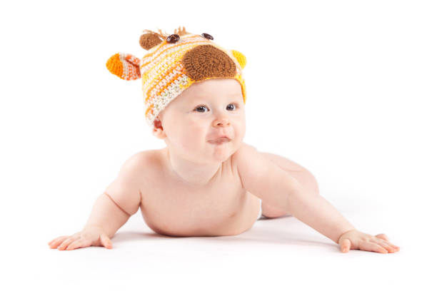 istock cutie little boy in white diaper and deer hat 681946252