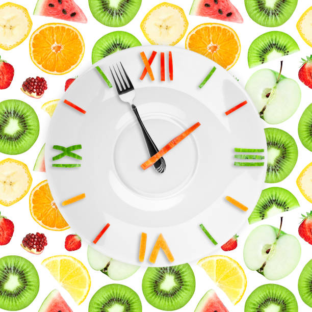 istock Food clock with fruits 681946336
