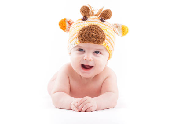 istock cute happy baby boy in diaper and deer hat 681946976