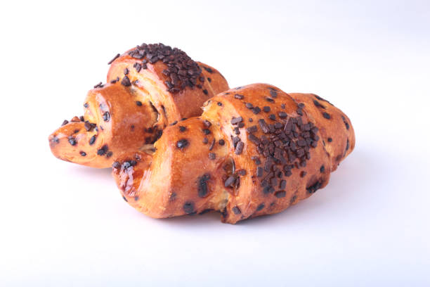 istock Crispy fresh croissant isolated on white background, selective focus. 681952052