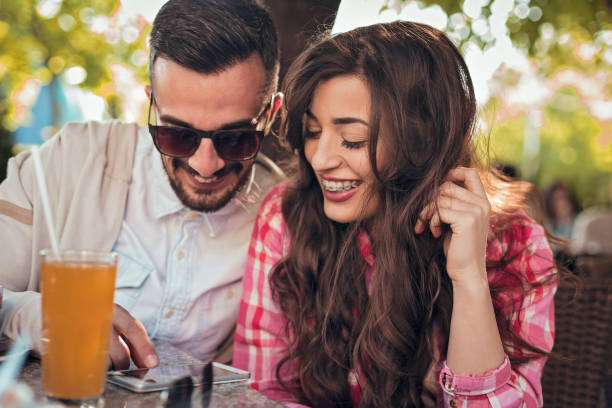 istock Beautiful couple sitting together in cafe 681962648