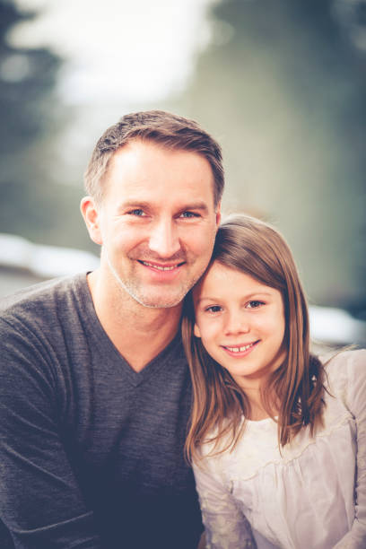 istock single father and daughter portrait 681966522