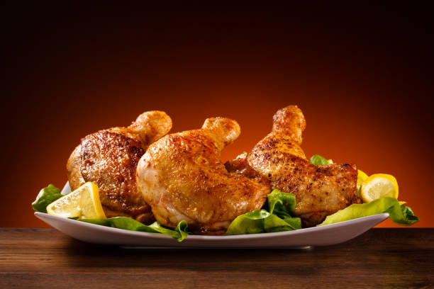ローストチキンレッグ - chicken roast chicken baked plate ストックフォトと画像