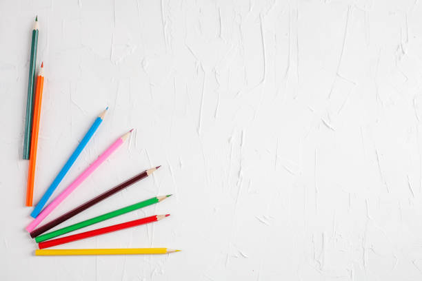 istock Colored pencils on white background. The concept of study and creativity. 681974538