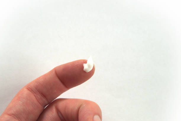 istock Dab of moisturizer displayed by a human finger 681976298