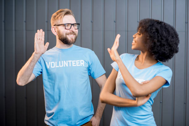 istock Young couple of volunteers 681978628
