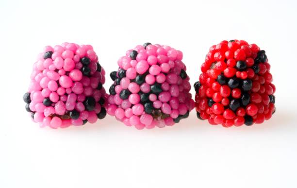 istock Red and purple candy jelly bean isolated on white 681982884