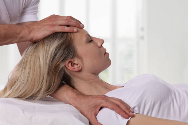 istock Woman having chiropractic back and neck adjustment. Osteopathy, Acupressure, Alternative medicine, pain relief concept. Physiotherapy, sport injury rehabilitation 681982930