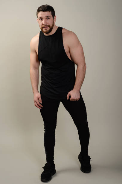 istock Handsome Athletic young man isolated on grey background 681984166