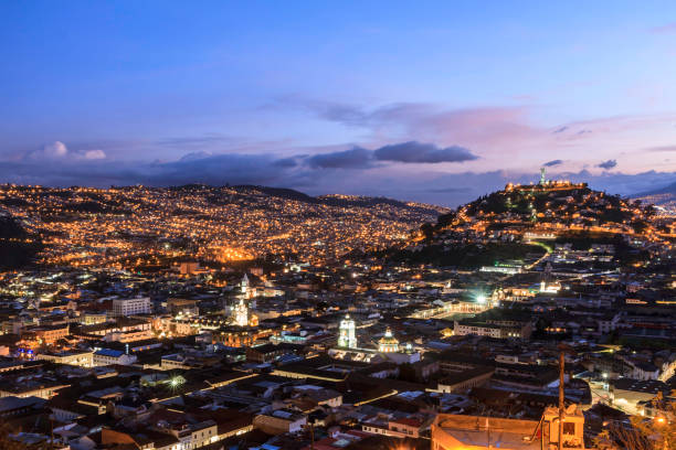 Quito at twilight Quito Ecuador panorama view shown at twilight quito photos stock pictures, royalty-free photos & images