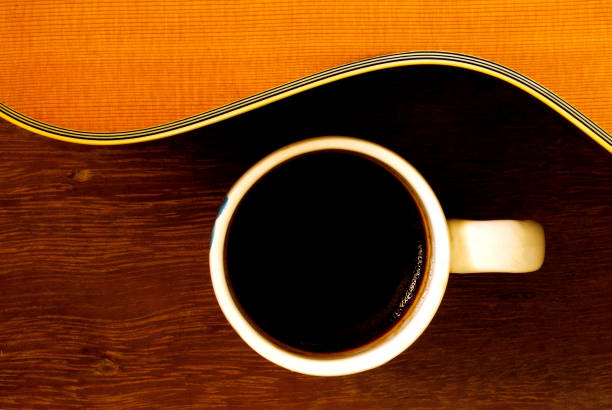 istock cup of coffee and acoustic guitar 682006936