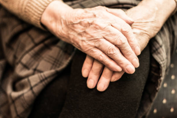 istock Grandmother's hands on the knee 682024614