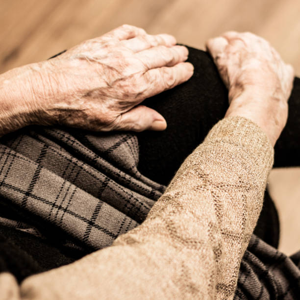 istock Grandmother's hands on the knee 682024830