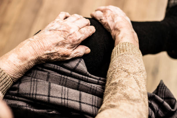 istock Grandmother's hands on the knee 682024838