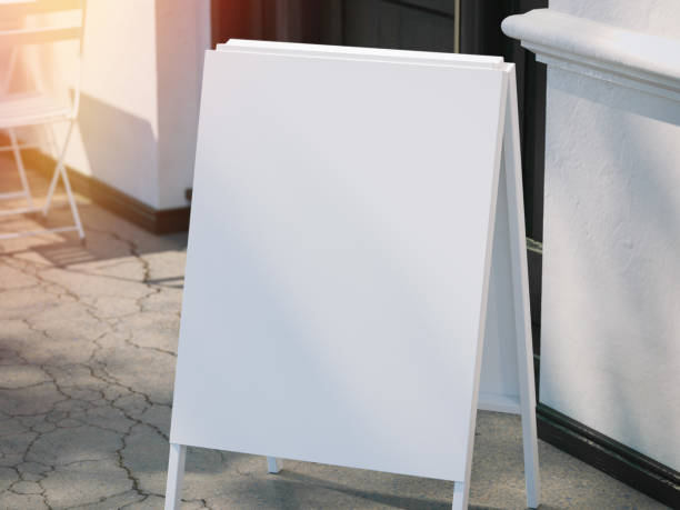 istock Close up of white blank menu board on sidewalk. 3d rendering 682028530
