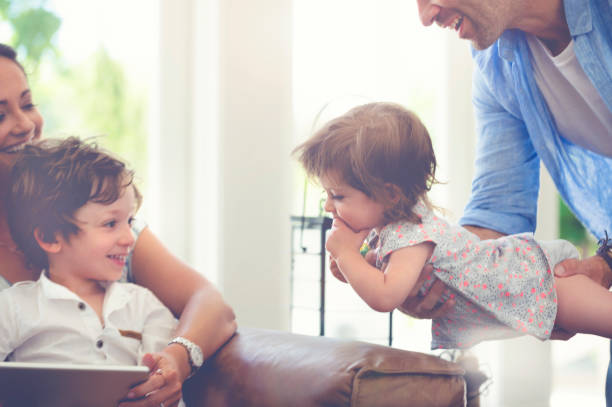 istock Family playing together on the sofa. 682039844