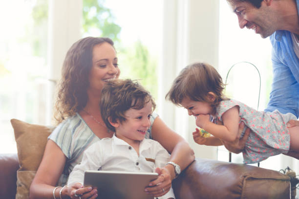 istock Family playing together on the sofa. 682039850