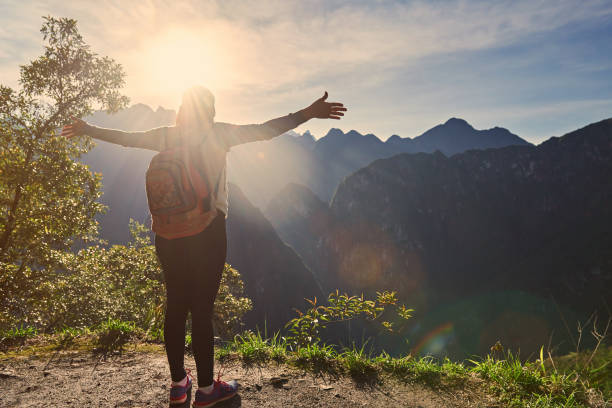istock Woman traveller meet new day 682040262