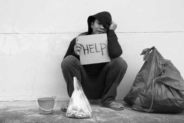 istock Homeless person with help sign 682063826