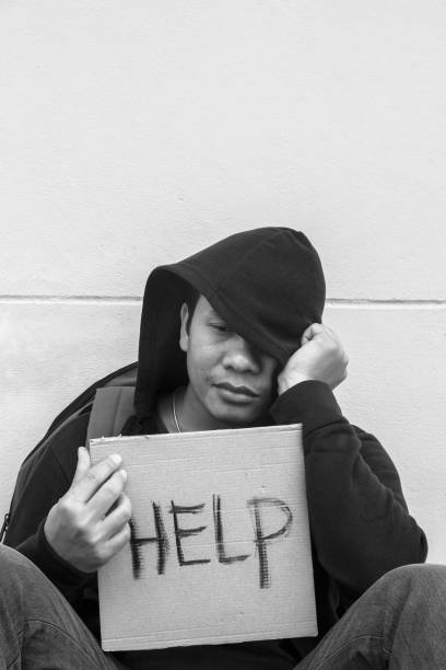 istock Homeless person with help sign 682063830