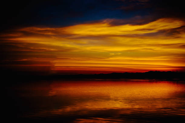 istock Landscapes of sunset on the beach with dramatic sky background. 682064408