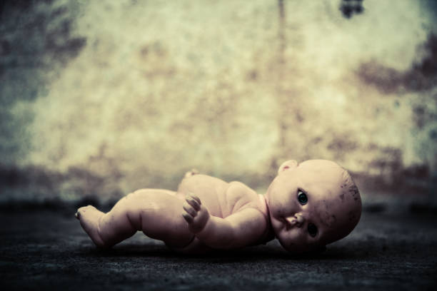 istock Spooky doll in haunted house 682064810