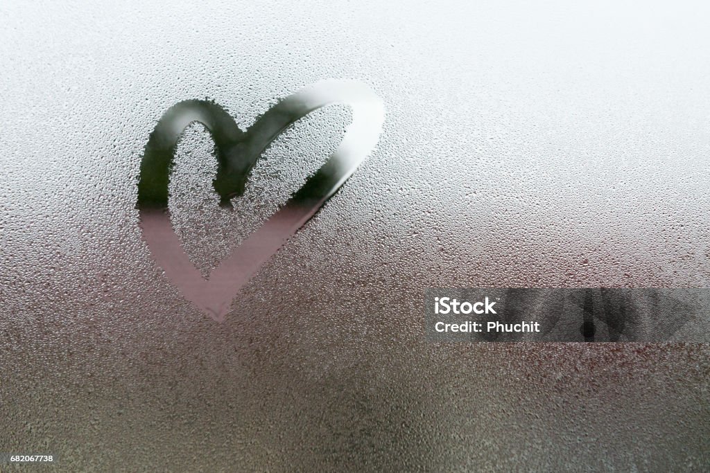 Drawn the heart shape Drawn the heart shape on vapor at the glass Glass - Material Stock Photo