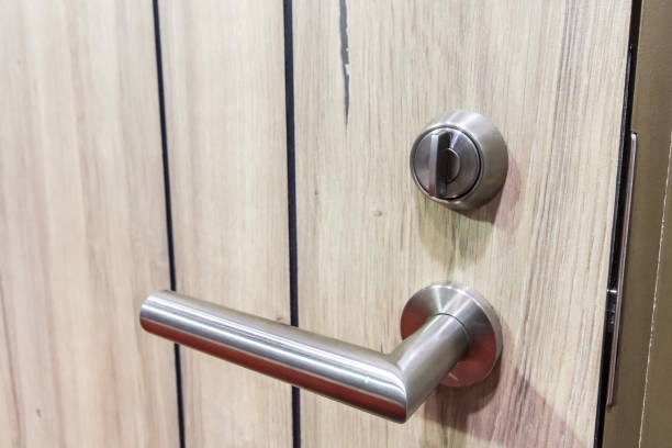 istock Mortise lock on modern wooden door 682074344