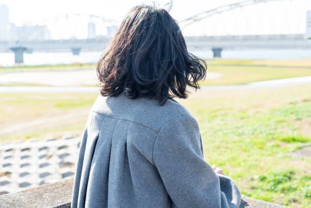 istock Woman watching the big city 682077992